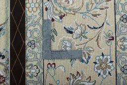 Backside of handmade 2000s Nain rug showing knot structure and weave density
