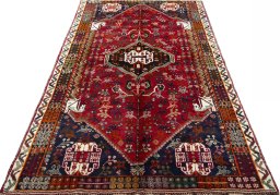 Surface texture of 1970s Shiraz rug with natural Wool and intricate pattern