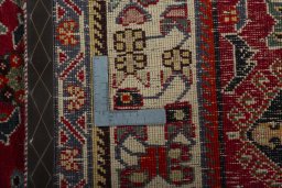 Close-up detail of 2000s Shiraz rug from Iran / Persia showing Wool weave