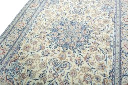 Backside of handmade 2000s Nain rug showing knot structure and weave density