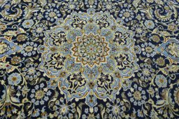 Central medallion detail of New Kashan rug from Iran / Persia