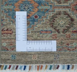 Corner detail of New Samarkand rug showing border pattern and Wool pile