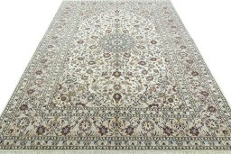 Surface texture of 2000s Kashan rug with natural Wool and intricate pattern