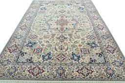 Surface texture of 2000s Nain rug with natural Wool and intricate pattern