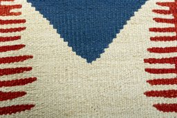 Backside of handmade New Modern Design rug showing knot structure and weave density