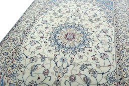 Backside of handmade 2000s Nain rug showing knot structure and weave density