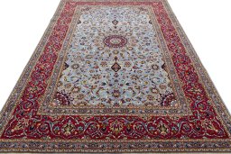 Surface texture of 2000s Kashan rug with natural Wool and intricate pattern