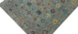 Backside of handmade New Farahan rug showing knot structure and weave density