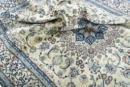 Surface texture of New Nain rug with natural Wool and intricate pattern