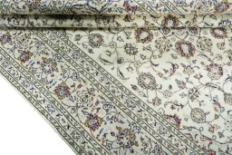 Close-up detail of 2000s Kashan rug from Iran / Persia showing Wool weave