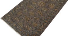 Backside of handmade New Farahan rug showing knot structure and weave density