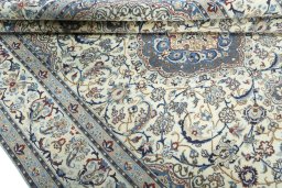 Close-up detail of 2000s Nain rug from Iran / Persia showing Wool weave