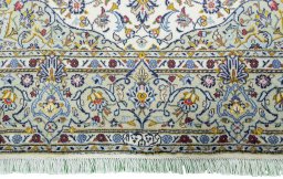 Full view of 2000s Kashan rug from Iran / Persia, 215 × 145 cm in Beige tones
