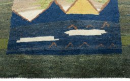 Central medallion detail of 2000s Persian Gabbeh rug from Pakistan