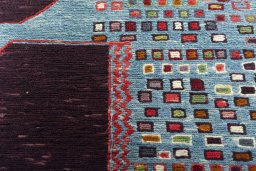 Backside of handmade New Kilim Dastan rug showing knot structure and weave density