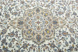 Central medallion detail of 2000s Kashan rug from Iran / Persia