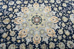 Central medallion detail of 2000s Najafabad rug from Iran / Persia