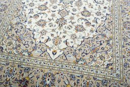 Close-up detail of 2000s Kashan rug from Iran / Persia showing Wool weave