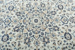 Central medallion detail of 2000s Kashan rug from Iran / Persia