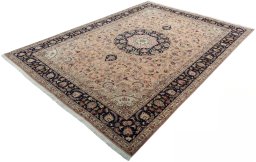 Corner detail of 2000s Tabriz 50/60/70 Raj rug showing border pattern and Cork pile