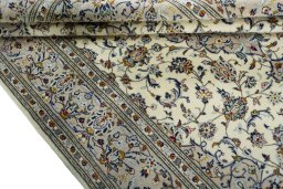 Close-up detail of 2000s Kashan rug from Iran / Persia showing Wool weave
