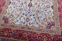 Close-up detail of 2000s Kashan rug from Iran / Persia showing Wool weave