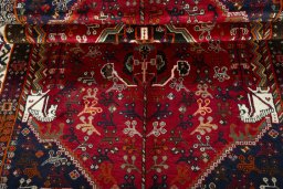 Corner detail of 1970s Shiraz rug showing border pattern and Wool pile