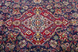 Central medallion detail of 2000s Kashan rug from Iran / Persia