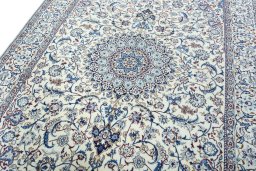 Backside of handmade 2000s Nain rug showing knot structure and weave density