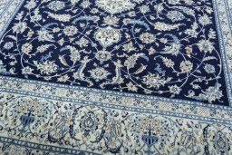 Close-up detail of 2000s Nain rug from Iran / Persia showing Wool weave
