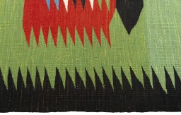 Close-up detail of New Kilim Sofre rug from Turkey showing Wool weave