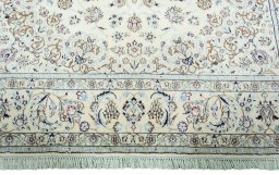 Full view of 2000s Nain rug from Iran / Persia, 293 × 198 cm in Beige tones
