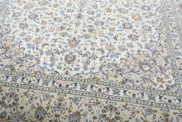 Close-up detail of 2000s Kashan rug from Iran / Persia showing Wool weave