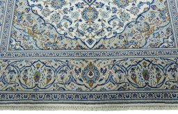 Full view of 2000s Kashan rug from Iran / Persia, 291 × 198 cm in Beige tones