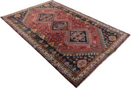 Close-up detail of 2000s Shiraz rug from Iran / Persia showing Wool weave