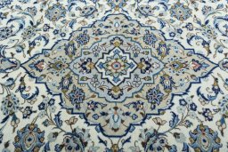 Central medallion detail of 2000s Kashan rug from Iran / Persia