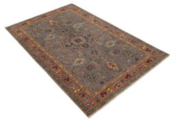Corner detail of New Kazak rug showing border pattern and Wool pile