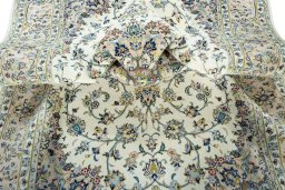 Surface texture of New Kashan rug with natural Wool and intricate pattern