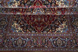 Close-up detail of 2000s Kashan rug from Iran / Persia showing Cork weave