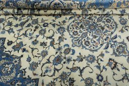 Close-up detail of 2000s Kashan rug from Iran / Persia showing Wool weave