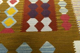 Backside of handmade New Kilim Dastan rug showing knot structure and weave density