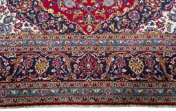 Full view of 2000s Kashan rug from Iran / Persia, 383 × 253 cm in Red tones