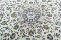 Central medallion detail of 2000s Kashan rug from Iran / Persia