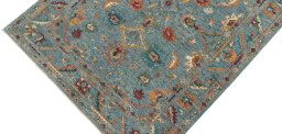 Backside of handmade New Farahan rug showing knot structure and weave density