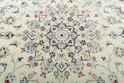 Central medallion detail of 2000s Kashan rug from Iran / Persia