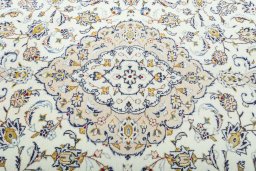 Central medallion detail of 2000s Kashan rug from Iran / Persia