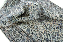Surface texture of 2000s Kashmar rug with natural Wool and intricate pattern