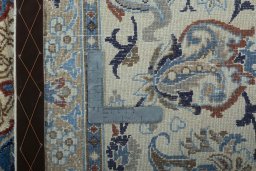 Backside of handmade 2000s Nain rug showing knot structure and weave density