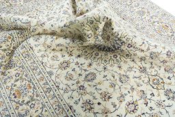 Surface texture of 2000s Kashan rug with natural Wool and intricate pattern