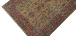 Backside of handmade New Farahan rug showing knot structure and weave density